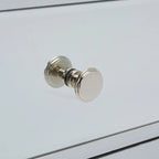 Scrivania con due cassetti a specchio e base in metallo